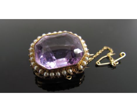 A Victorian amethyst and seed pearl brooch, one pearl missing, 23mm x 20mm