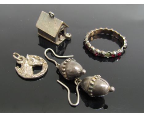 A pair of white metal earrings, two charms and a paste set ring