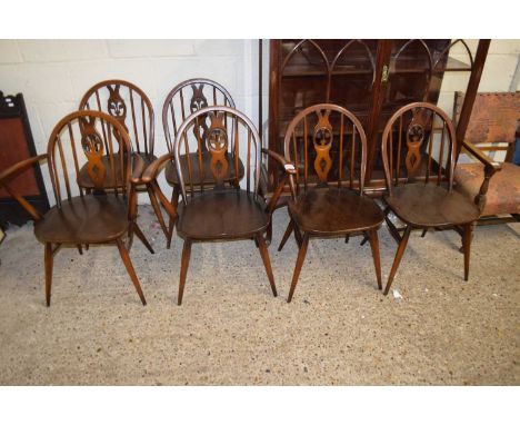 SET OF SIX DARK ERCOL DINING CHAIRS WITH FLEUR DE LIS BACKS