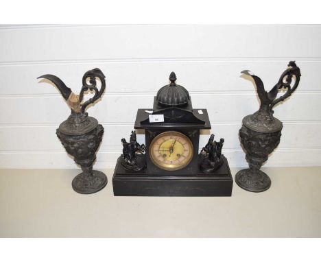 VICTORIAN BLACK SLATE MANTEL CLOCK TOGETHER WITH A PAIR OF SPELTER EWERS