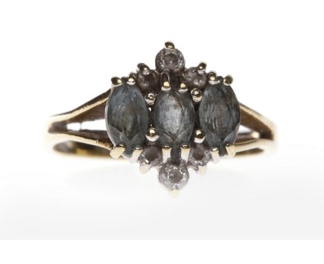 NINE CARAT GOLD GEM SET RINGset with three oval blue gems and six round white gems, size K, 2.6g