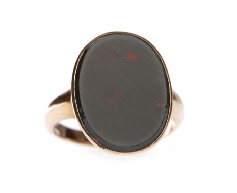 GENTLEMAN'S EARLY TWENTIETH CENTURY BLOODSTONE SIGNET RINGthe oval stone measuring approximately 15.9x11.8mm, in nine carat r