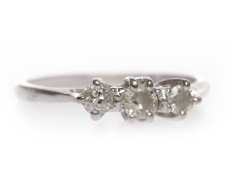 EIGHTEEN CARAT WHITE GOLD DIAMOND THREE STONE RINGset with graduated round brilliant cut diamonds totalling approximately 0.1