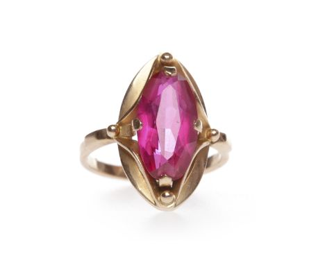 ROSE GOLD CREATED RUBY DRESS RINGset with a single marquise shaped created ruby 14mm long, size O-P, marked 583 to the exteri