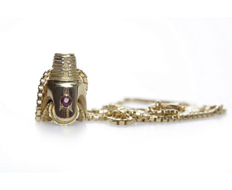 FOURTEEN CARAT GOLD PENDANTset with a single round ruby, on a fourteen carat gold chain, 11.5g gross