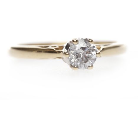 EIGHTEEN CARAT GOLD DIAMOND SOLITAIRE RINGwith a six claw set round brilliant cut diamond of approximately 0.30 carats, size 
