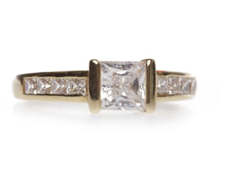 EIGHTEEN CARAT GOLD CZ DRESS RINGset with a single central square CZ on channel set CZ shoulders, size K, 2.7g