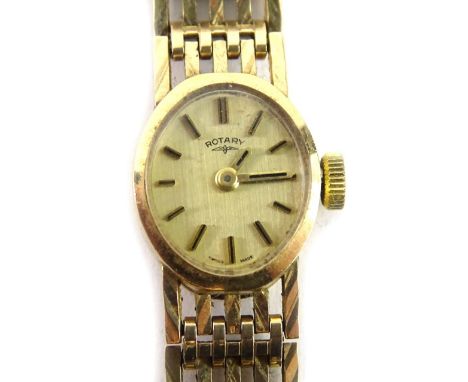 A 9ct gold Rotary ladies wristwatch, with small circular watch head, on a five row pierced bracelet, 17.5g all in. 