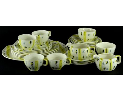 A Midwinter Stylecraft part tea service, decorated in yellow and turquoise with geometric devices, to include a meat dish, di
