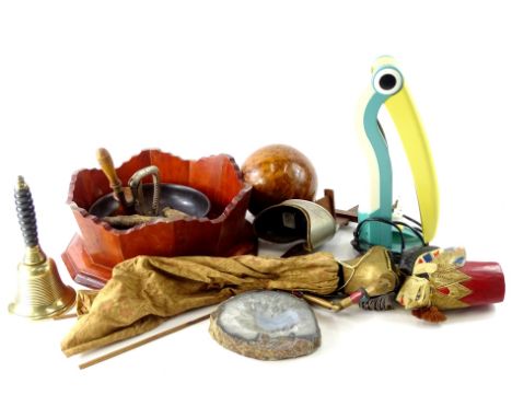 Miscellaneous items, to include a stereo viewer, an Eastern puppet, turned yew globe or ball, brass bell, nutcracker, small j