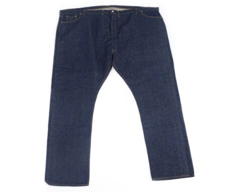A large oversized pair of Levi 501 vintage jeans, with original untouched labels to reverse stating size 76 waist and 46 leg.