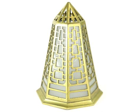 An early 20thC pierced brass Art Deco shaped light fitting, with white opaque glass to the interior, 35cm H.