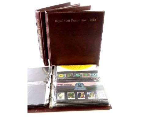 Three albums of first day covers or presentation plaques.
