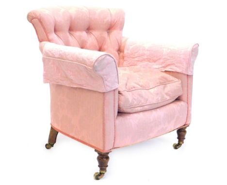 A Victorian mahogany tub shaped armchair, with a button back padded seat upholstered in pink damask fabric, on turned taperin