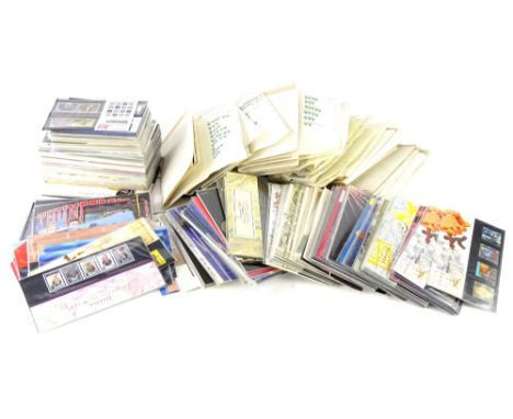 A large quantity of presentation stamp packs, various commemorative issues and a quantity of First Day covers, etc. (2 boxes)