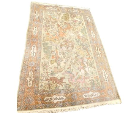 An Indian Kashmir rug, decorated with hunting scenes involving leopards, lions, etc., on a beige ground with inscribed border