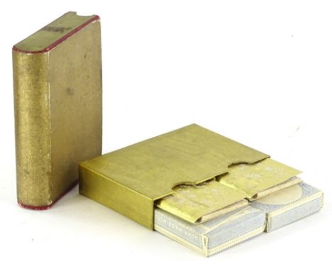 Two packs of unopened John Waddington playing cards, and two bridge scoring books each with original miniature pencil in a gi