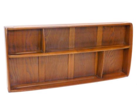 An Ercol light elm wall mounted plate rack, with three shelves, 107cm W.