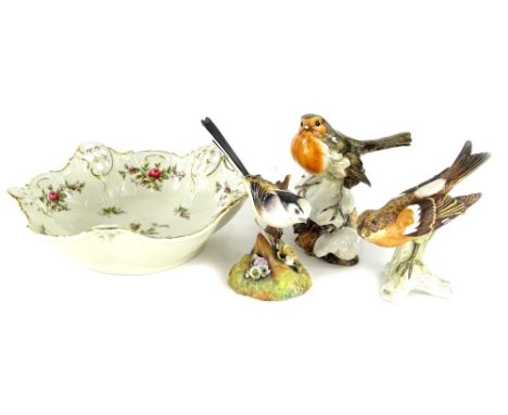 A Goebel ceramic figure of a robin, a Royal Crown Derby long tailed tit, another robin and a Rosenthal pierced bowl, decorate