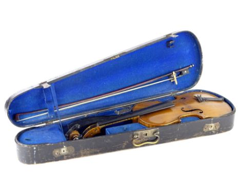 A violin, with one piece back, label to interior for ER Schmidt and Co, violin maker, bearing signature titled Antonius Strad