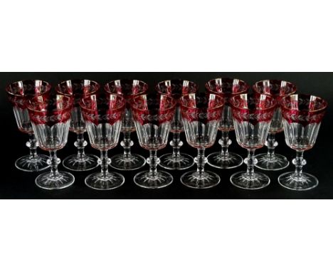 A set of ruby tinted wine glasses, each engraved with leaves, etc. (12)