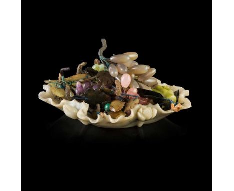 HARDSTONE FRUITS 20TH CENTURY naturalistically carved from various colour crystal and stone, including purple, green and pink