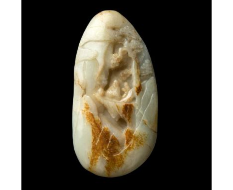CARVED PALE CELADON AND RUSSET JADE BOULDER the stone carved on one side in high relief with Shoulao and his attendent beneat