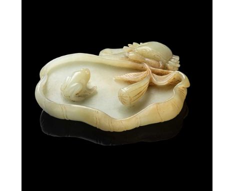 CELADON JADE 'LOTUS' BRUSH WASHER QING DYNASTY, 19TH CENTURY carved with two flattened lotus leaves, a frog resting on the la