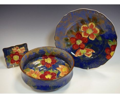 A Royal Doulton Wild Roses series, pattern no. 6227 footed fruit bowl conforming plate and trinket dish (3)
