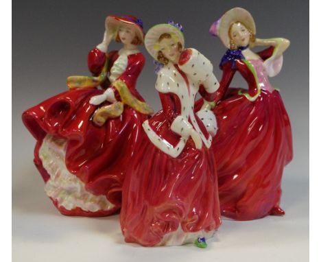 Royal Doulton figures including Autumn Breezes HN1934; Top O' The Hill HN1834; Christmas Morn HN1992 (3)