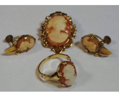 A 9ct gold cameo ring, size ; a 9ct gold cameo brooch/pendant, gross weight 7.9g; a pair of rolled gold cameo earrings