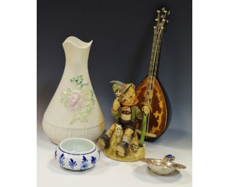 Boxes and Objects - a Dutchsilver tea strainer stamped  90 with Delft stand; a Goebel Hummel figure seated boy; a musical clo