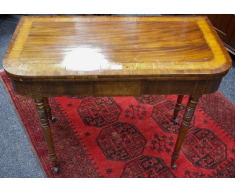 A Regency mahogany card table. 
