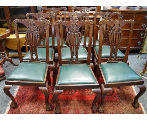 A Set of eight Chippendale style dining chairs, including two carvers.  