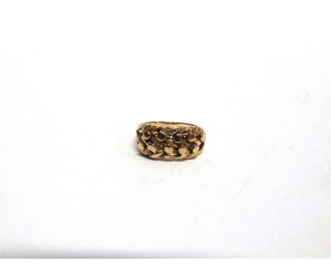 A RING of plaited design, unmarked, 4.3g gross