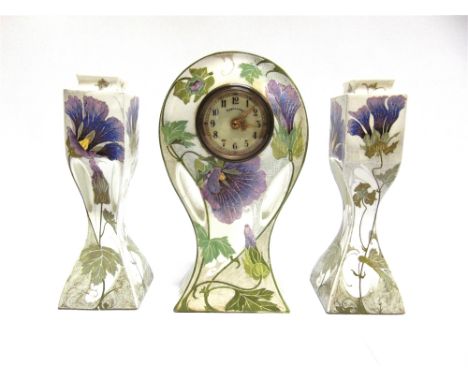 ROZENBURG DEN HAAG: a porcelain clock garniture in the Art Nouveau taste with polychrome floral decoration, marks to base and