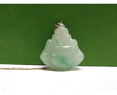 A CARVED JADE BUDDAH PENDANT PENDANT  on a chain, stamped '375', 43cm long, 1g gross, Buddah 5cm long and 32g gross