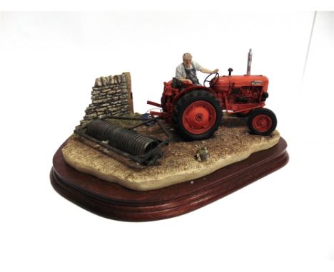 A BORDER FINE ARTS TRACTOR GROUP 'TURNING WITH CARE' 34cm long