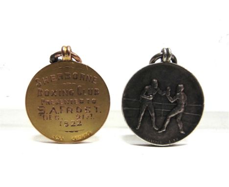 A 9 CARAT GOLD BOXING MEDAL Birmingham 1922, the front with two pugilists in the ring, 7.5g gross; another similar medal in s