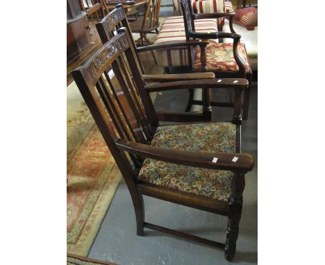 Pair of early 20th Century oak open arm dining chairs, together with a 19th Century mahogany Chippendale style open armchair.