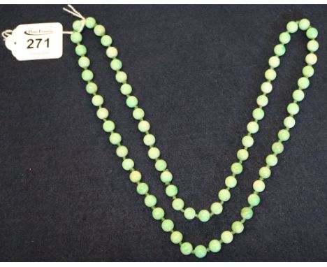 A long string of jade beads. (B.P. 24% incl. VAT)