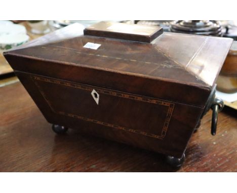 19th Century sarcophagus shaped tea caddy, the interior revealing two compartments standing on spherical feet. (B.P. 24% incl