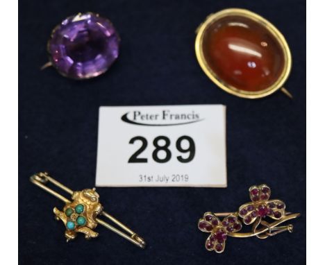 Small collection of brooches to include; a ruby double flower brooch, amethyst brooch, yellow metal and turquoise brooch and 