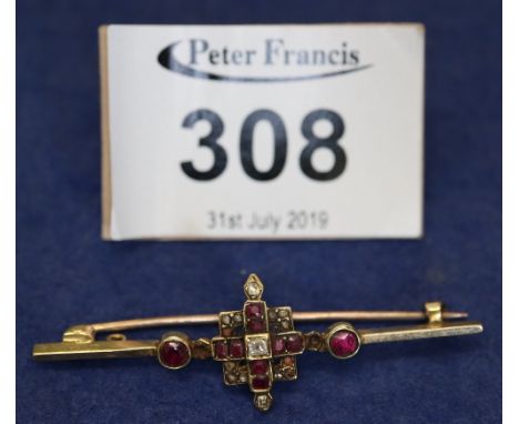 A Victorian diamond and ruby brooch. Weight 4.8g approx.(B.P. 24% incl. VAT)