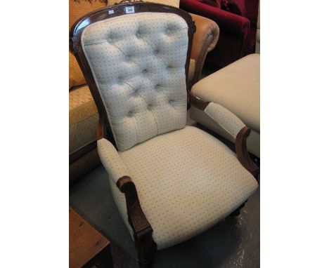 Victorian walnut button back upholstered fireside open armchair. (B.P. 24% incl. VAT)