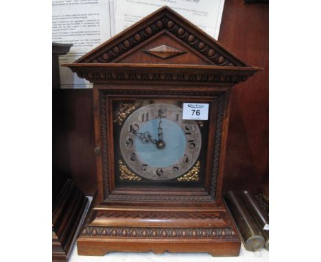 20th Century battery operated oak architectural mantel clock.(B.P. 24% incl. VAT)