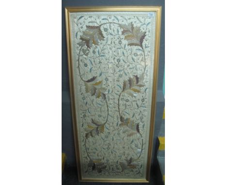 Framed and glazed silk embroidered (probably Indian) panel with leaf, floral and foliate design, embroidered with gold and si