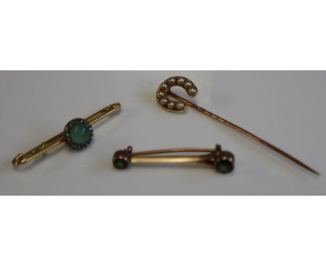 A pearl set stick pin, diamond set and greenstone brooch and another greenstone brooch. (B.P. 24% incl. VAT)