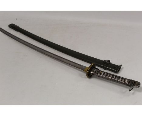 WW II Japanese N.C.O.'s sword. In scabbard. 