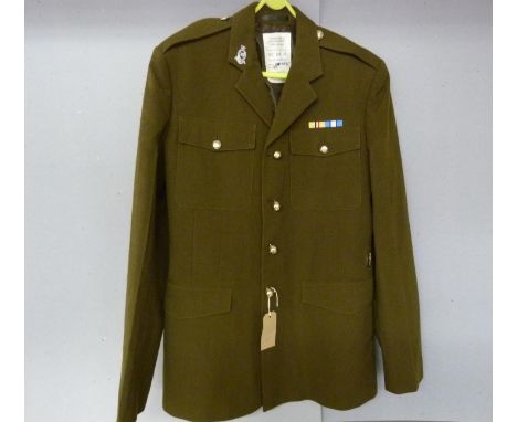 British Army dress uniform khaki green jacket with Royal Horse Artillery collar badge, spherical buttons and medal ribbons fo